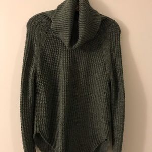 Green turtleneck sweater